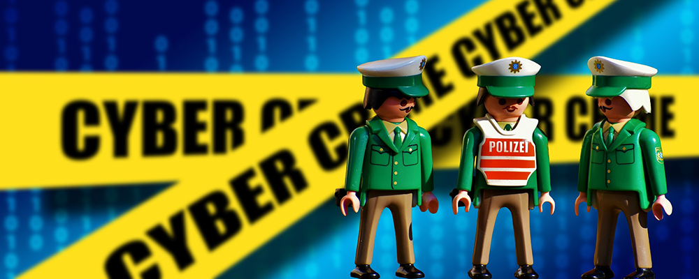 European lego police with cyber crime tape behind them